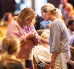 Two people praying