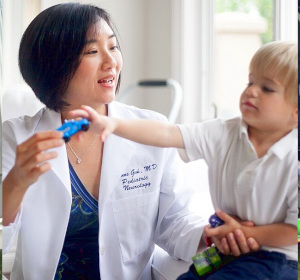 Pediatrician with child